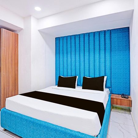 Super Hotel O Althan Formerly Hotel Niraant Surat Bagian luar foto